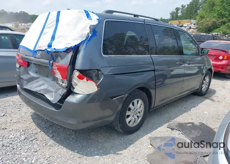 2010 Honda Odyssey Ex-L z USA, uszkodzony, nr VIN 5FNRL3H64AB087235
